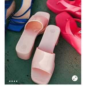 Light pink jelly sandals from Urban Outfitters